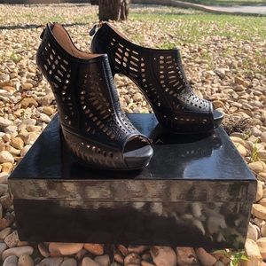 Slightly worn black Escada heels